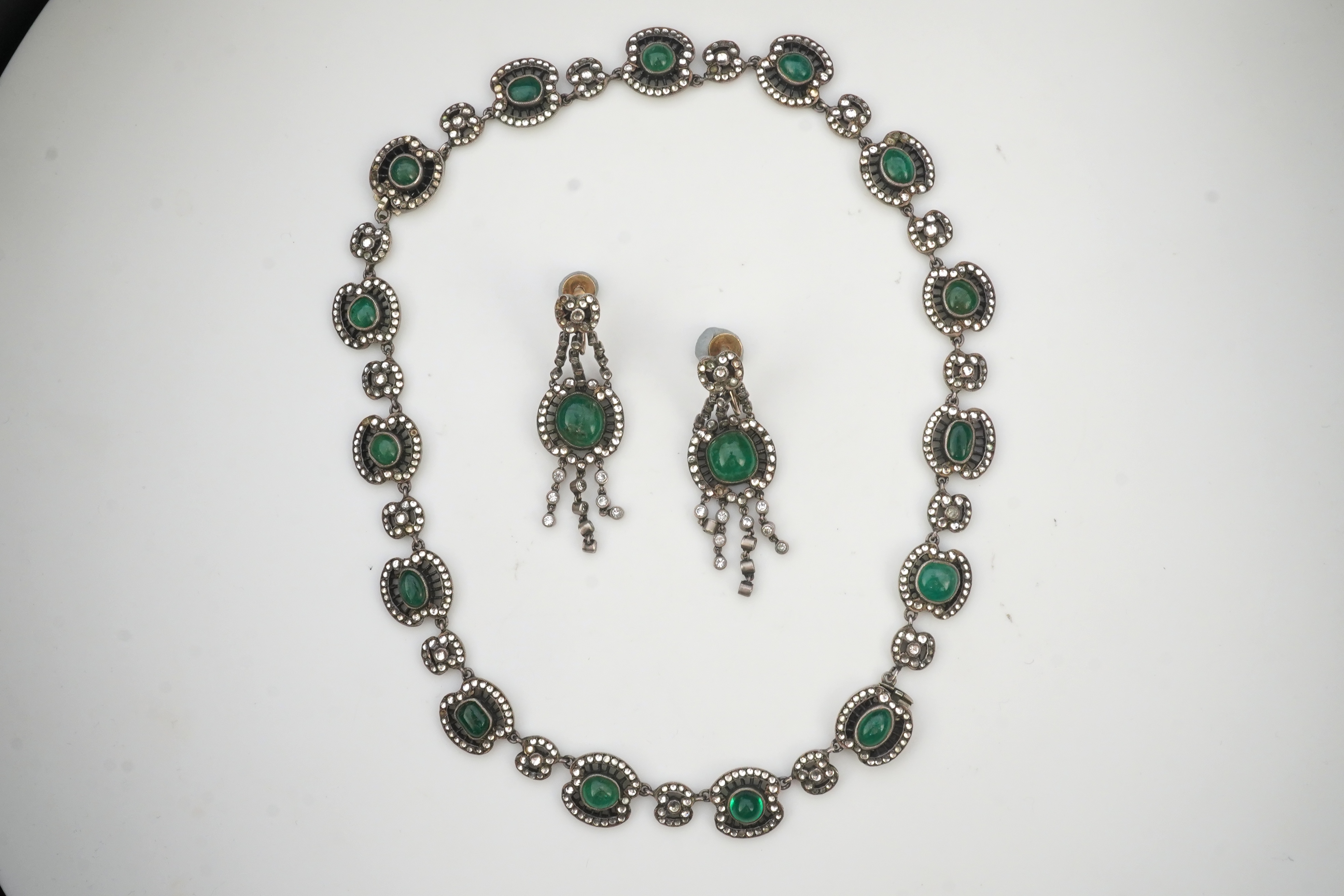 An emerald and rock crystal demi-parure, France, early 20th century